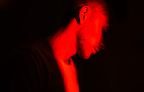 side-view-portrait-of-caucasian-young-man-in-a-dar-2026-01-07-06-23-27-utc